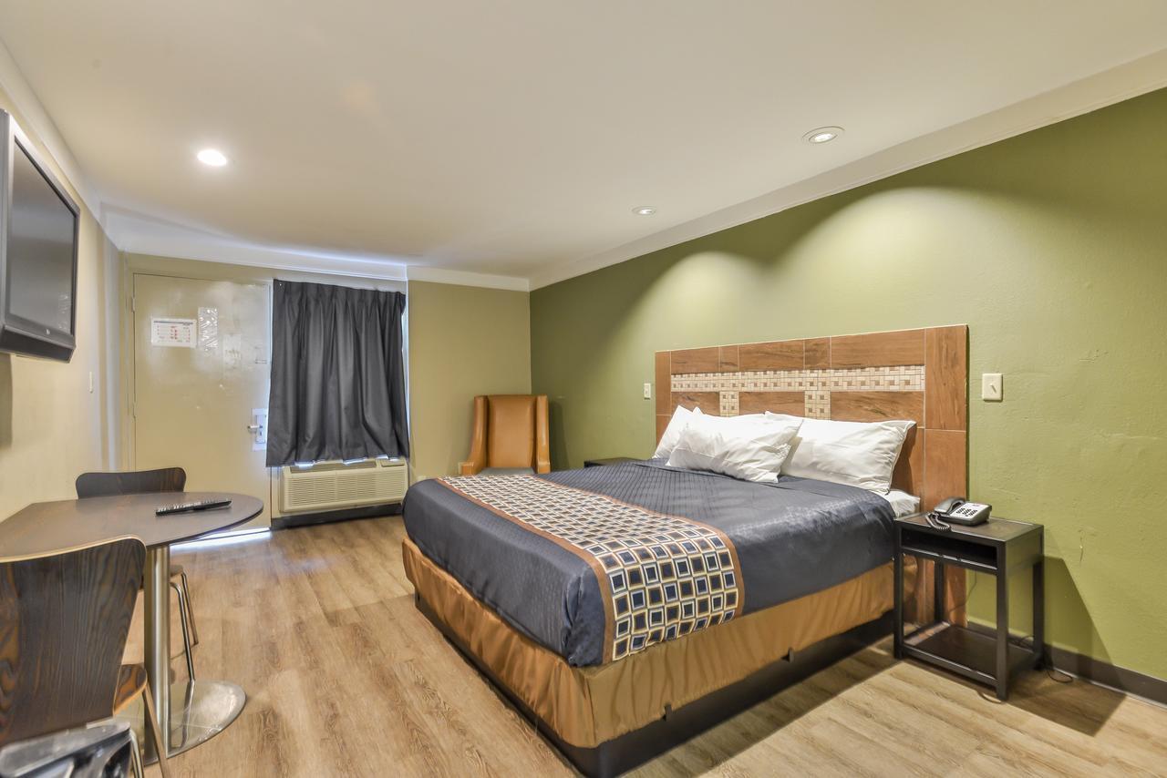 Budgetel Inn And Suites Роли Экстерьер фото