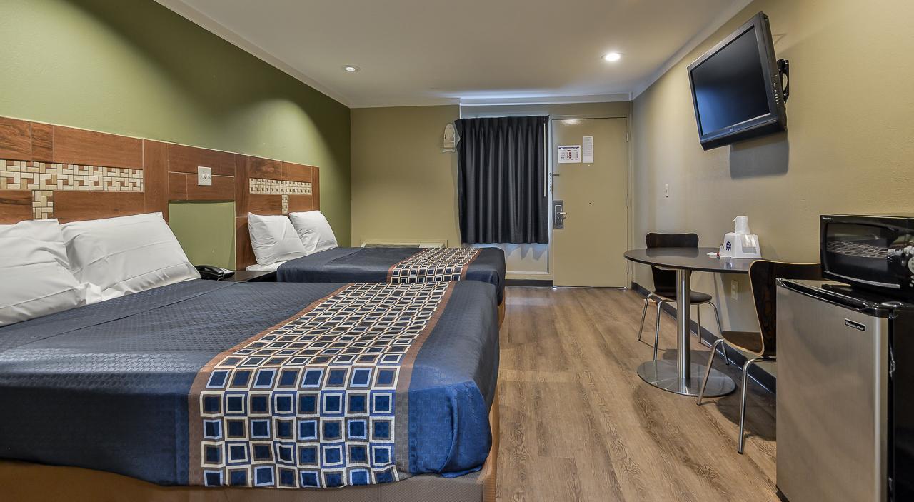 Budgetel Inn And Suites Роли Экстерьер фото